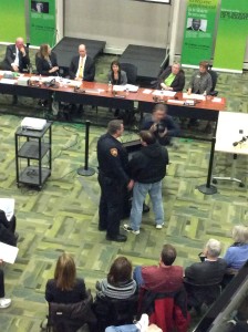 iratespeaker-with-officer